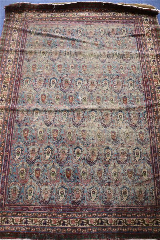 A Persian green ground boteh rug 190 x 135cm